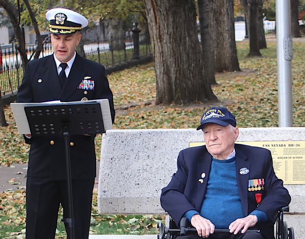 Former USS Nevada sailor Richard Ramsey, right, with Capt. Shane Tannerat the USS Nevada memorial. Steve Ranson / NNG.