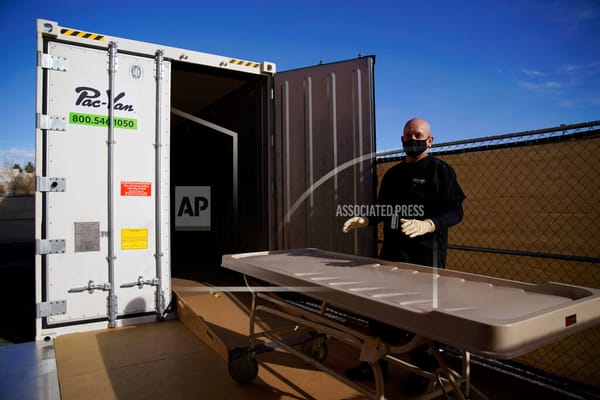 Michael Murphy, a consultant serving as interim Clark County coroner, gives a tour of a refrigerated trailer at the coroner's