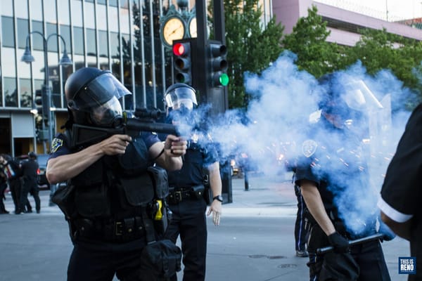 Reno Police officers shoot rubber bullets at rioters on May 30, 2020 in Reno, Nev.