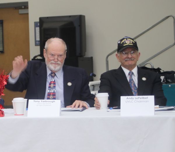 Tony Yarbrough, left, former chairman of the United Veterans Legislative Council, raises a point at the 2022 symposia in Marc